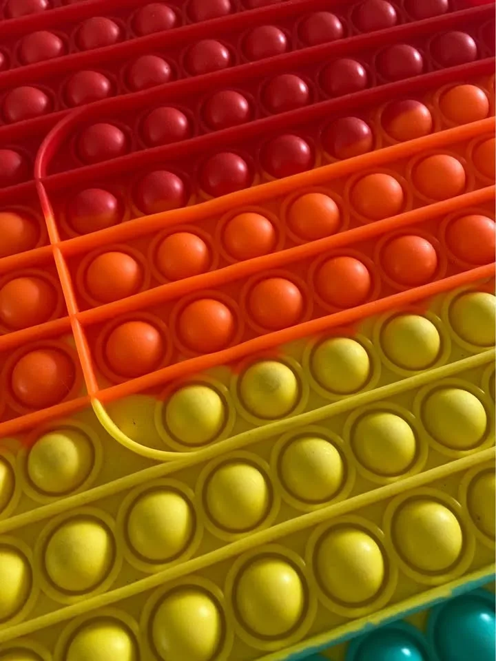 LIKE NEW: Giant Rainbow Among Us Fidget Toy Pop It image indicator(5)