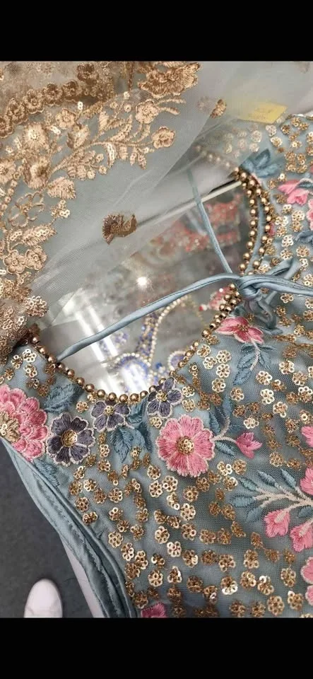 Pink and blue floral Very detailed wedding lengha image indicator(3)