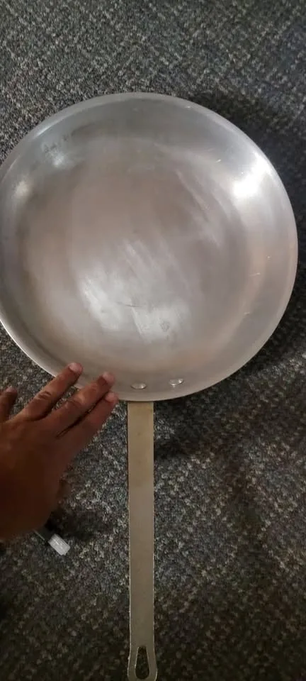 12 inch stainless frying pan Asking $10 Hubert brand Made in Kor