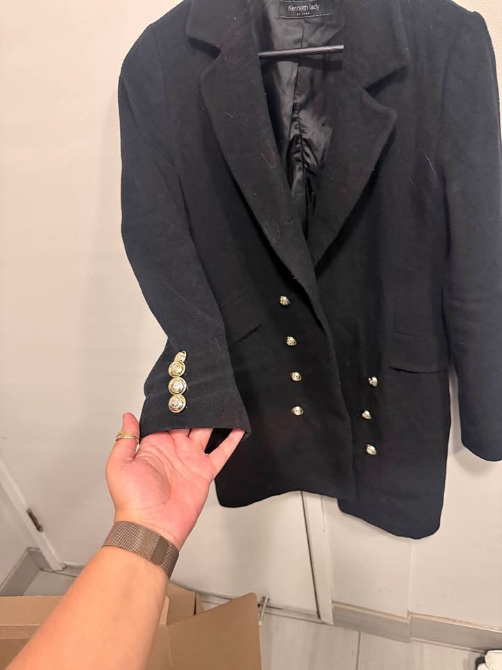 Black coat with gold buttons