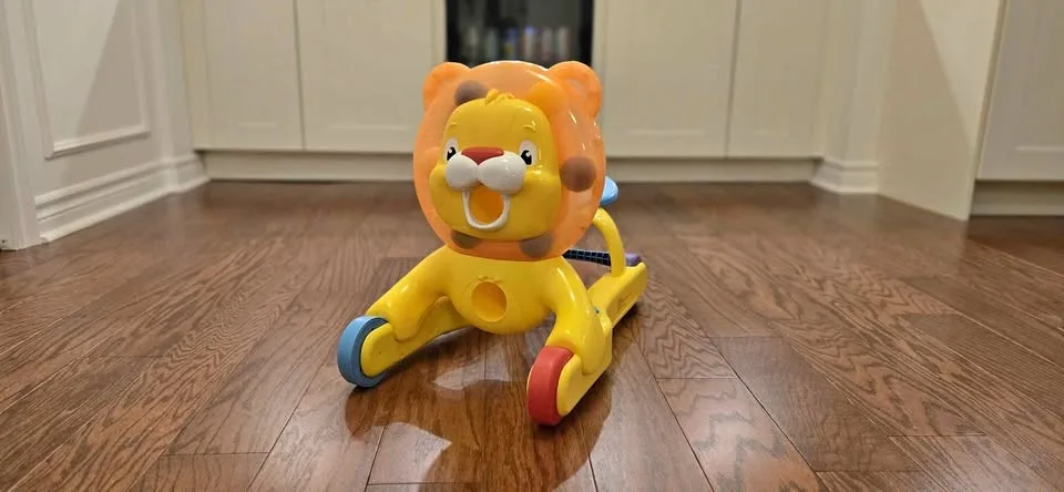 Step n' Ride Lion - Bright Starts