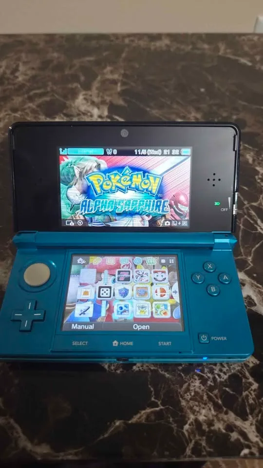 Aqua Blue Modded Nintendo 3DS | 8gb SD | hShop & Every Game image indicator(7)