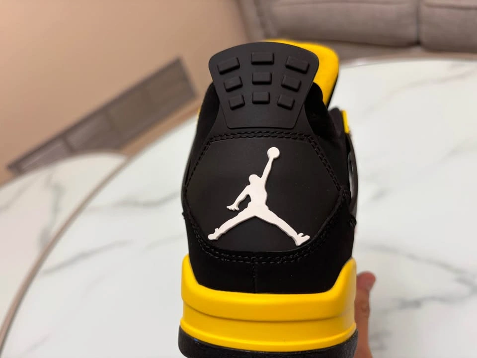Jordan 4s Yellow Thunders - photo 2