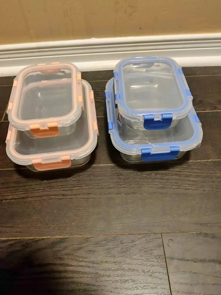 Brand new 4pc airtight glass food storage containers