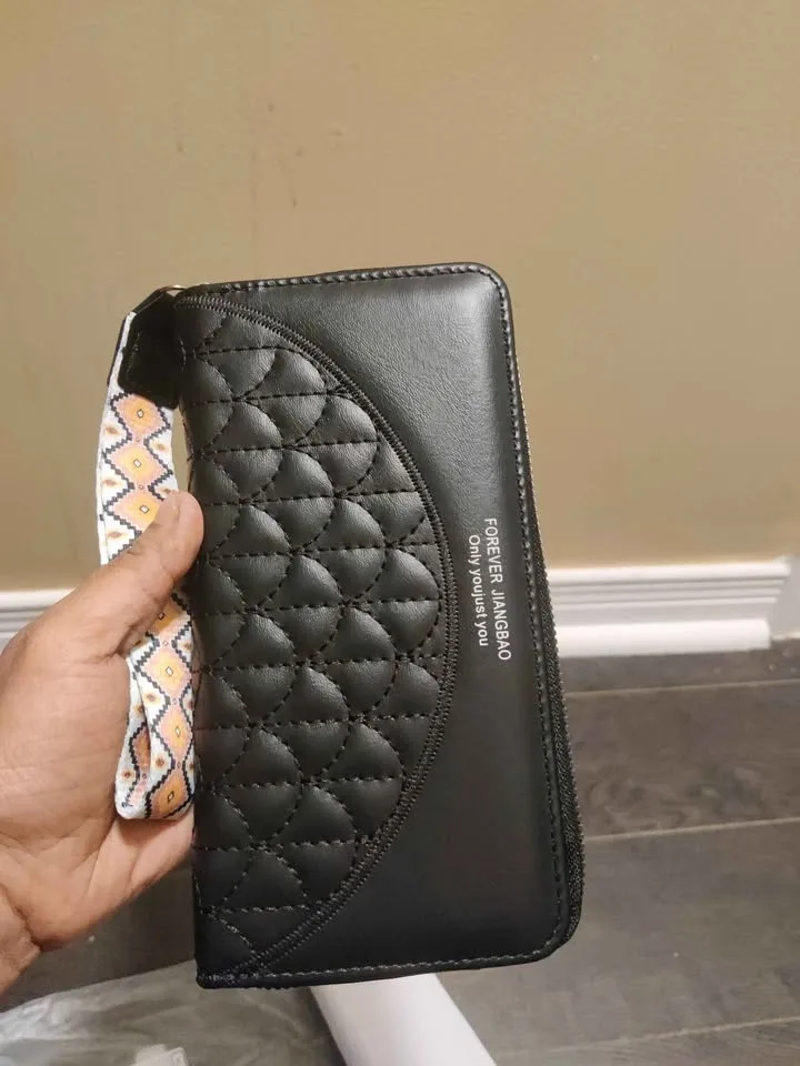 Brand new black color elegant faux leather phone. Wallet image indicator(2)