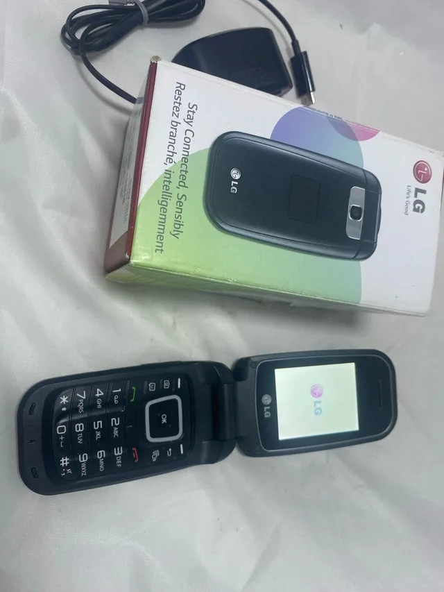 LG F4NR Vintage Mobile Phone Locked To bell With Charg image indicator(2)