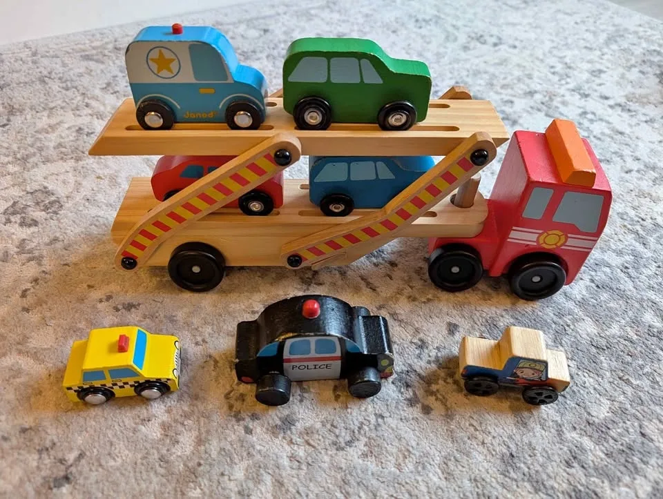 Wooden car transporter with vehicles