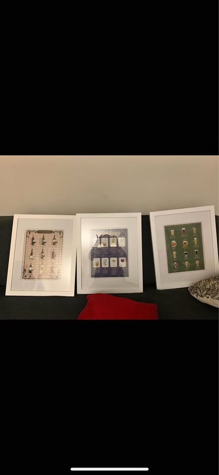 3 white canvas frames with puzzles