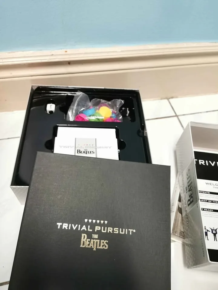 The Beatles Unseen Archives + Beatles Trivial Pursuit image indicator(6)