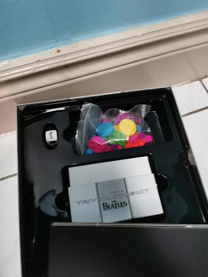 The Beatles Unseen Archives + Beatles Trivial Pursuit image indicator(7)