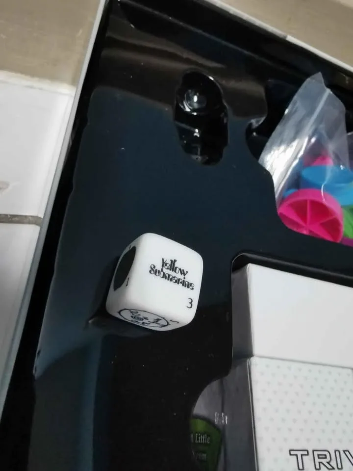 The Beatles Unseen Archives + Beatles Trivial Pursuit image indicator(9)