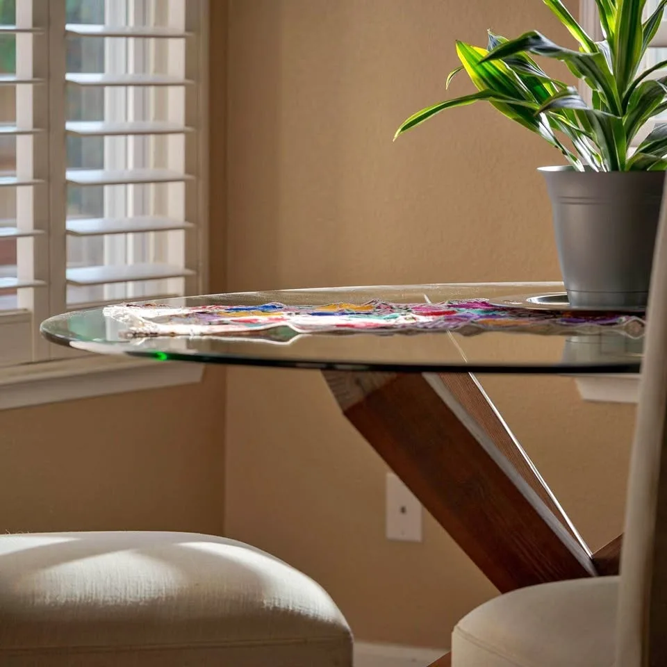 Glass and wood dinner table