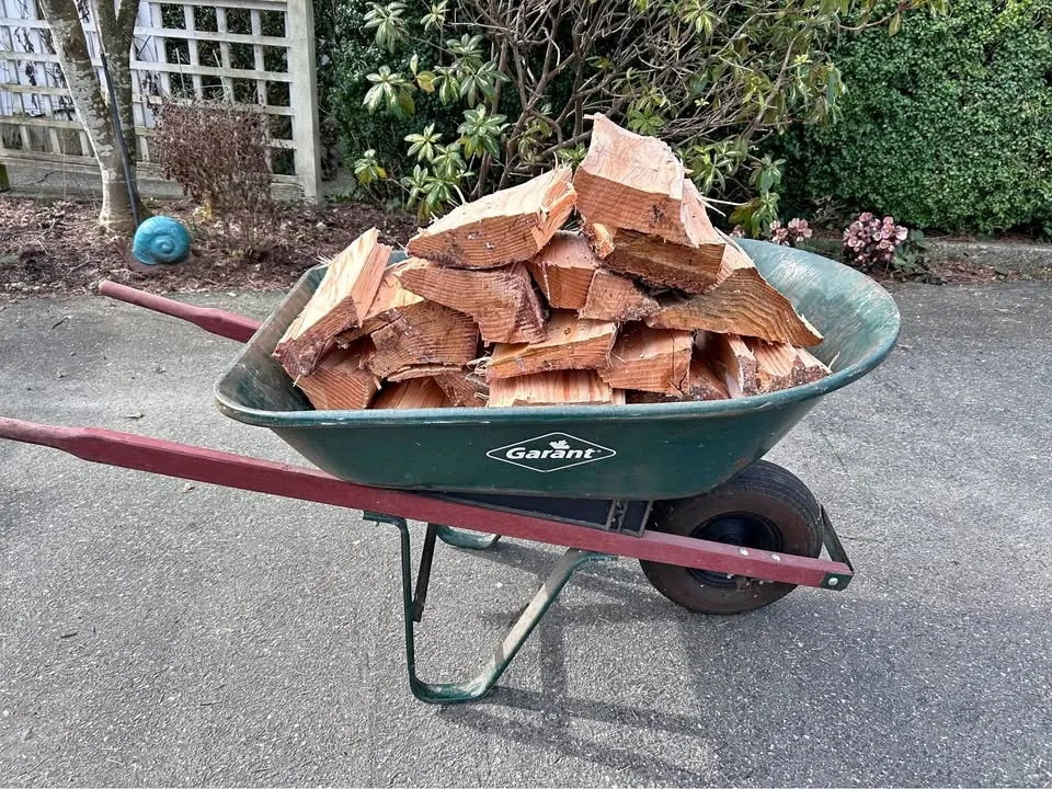 Split Dry Firewood. Douglas fir. By the wheelbarrow full
