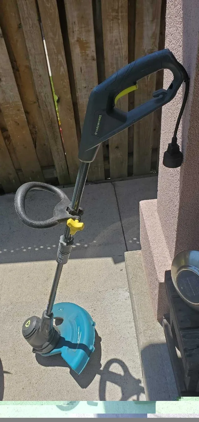 Yardworks and Ryobi Electric Weed Trimmer 14 in. #cleanout image indicator(9)