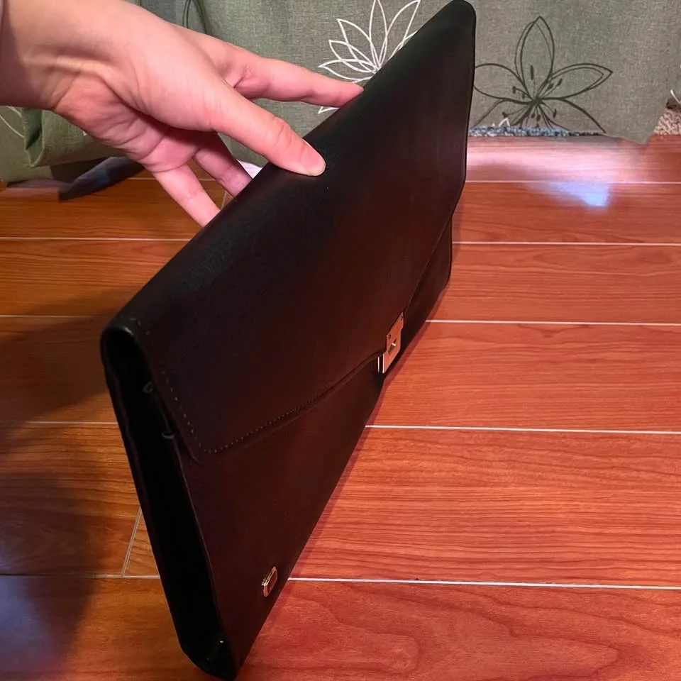 Black Envelope Clutch with Gold Accents image indicator(2)