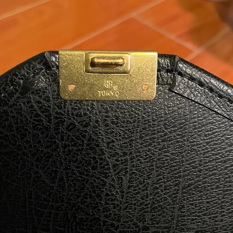 Black Envelope Clutch with Gold Accents image indicator(5)