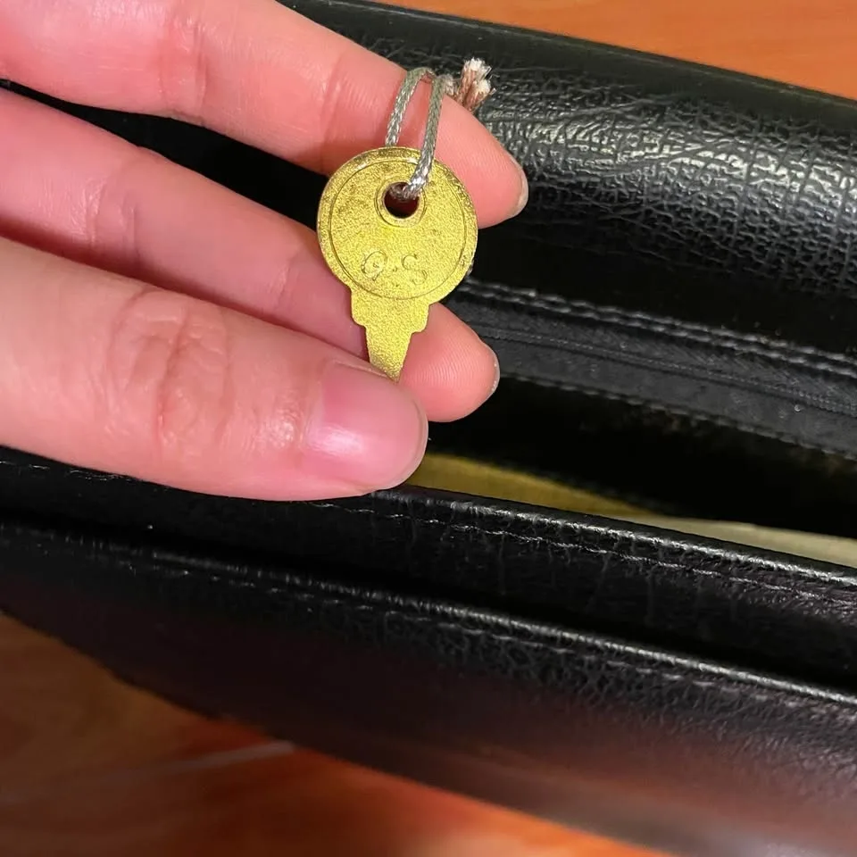 Black Envelope Clutch with Gold Accents image indicator(6)