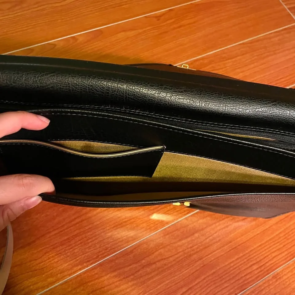 Black Envelope Clutch with Gold Accents image indicator(9)