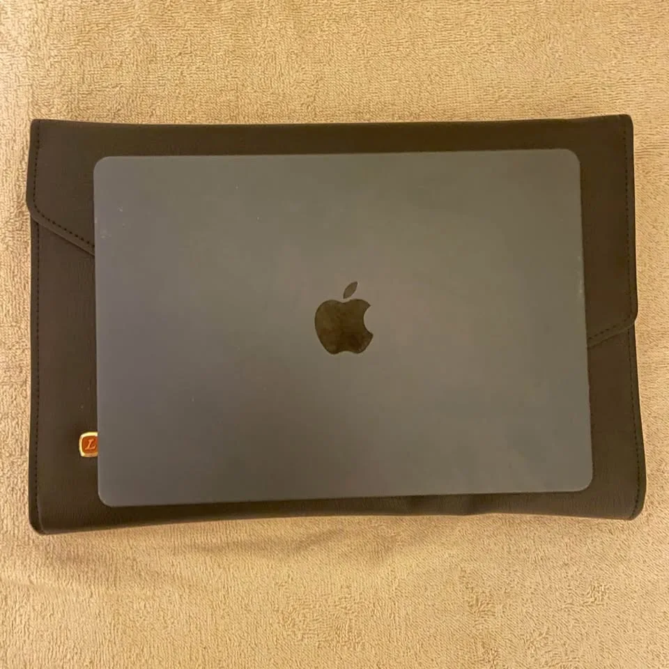 Black Envelope Clutch with Gold Accents image indicator(10)