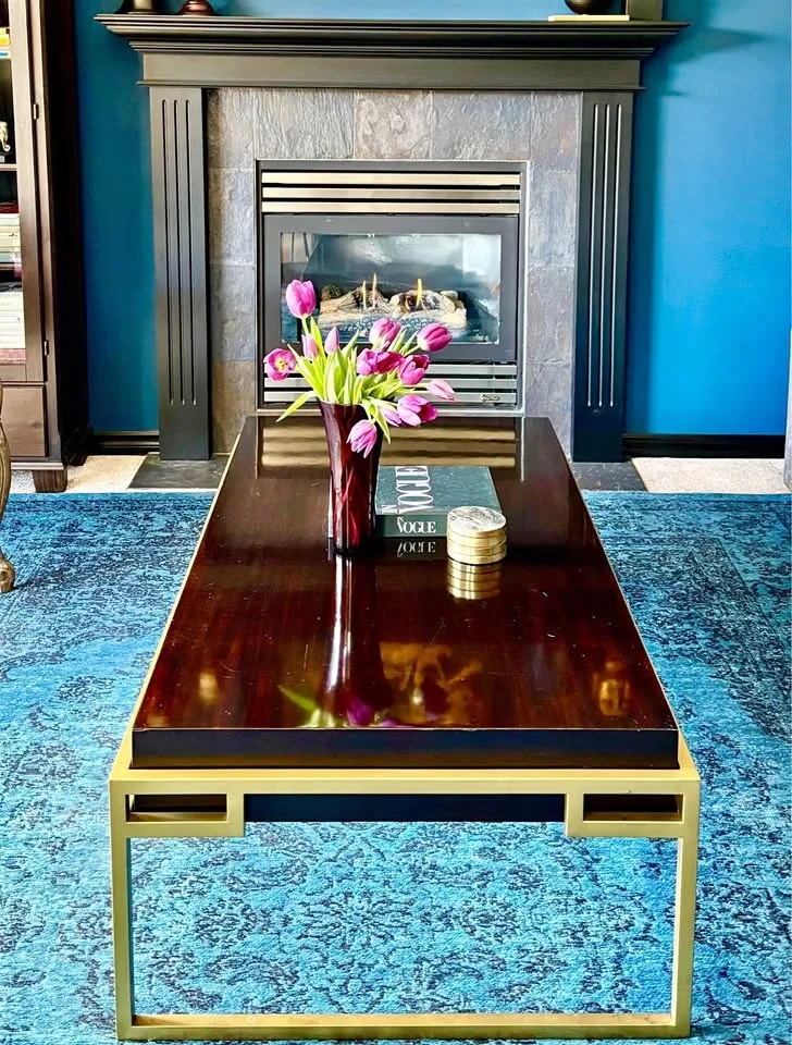 Gorgeous solid wood coffee table with brass frame and legs