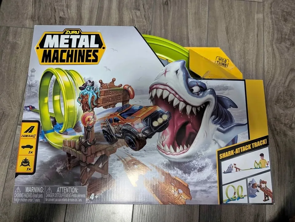 Brand New in box dinosaur racing car track