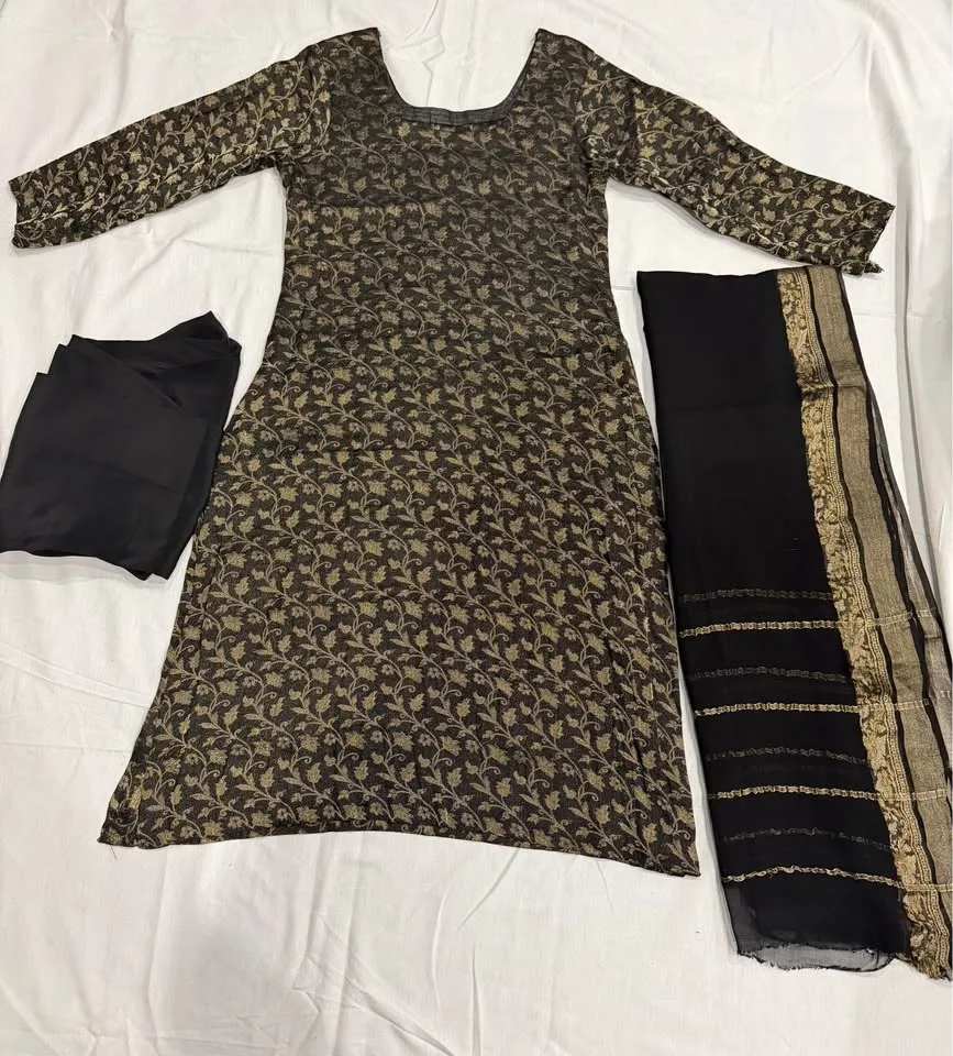 Very elegant silk and banarsi salwar suit in black image indicator(4)