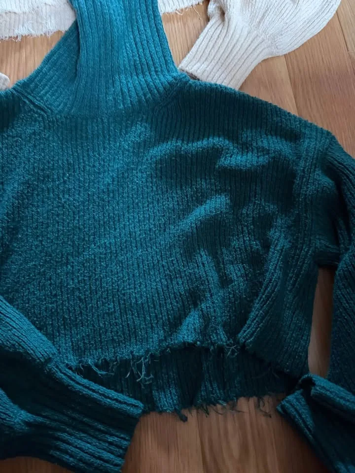 Set of two cropped and frayed turtleneck sweaters. Size Small image indicator(2)
