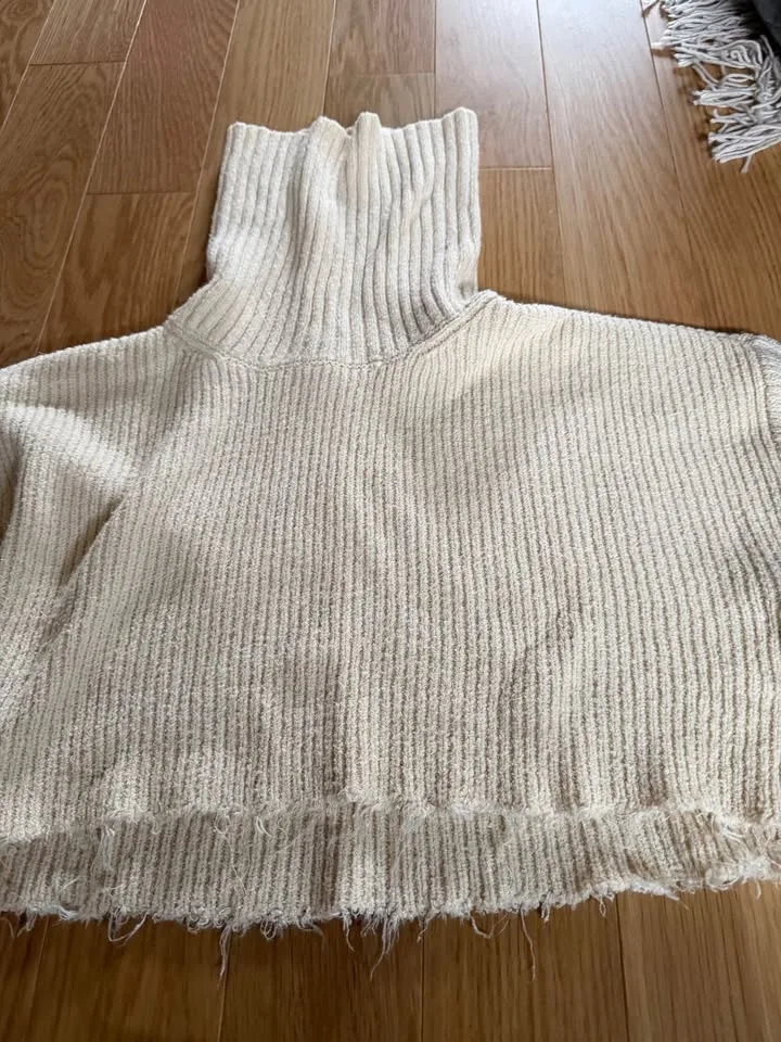Set of two cropped and frayed turtleneck sweaters. Size Small image indicator(4)