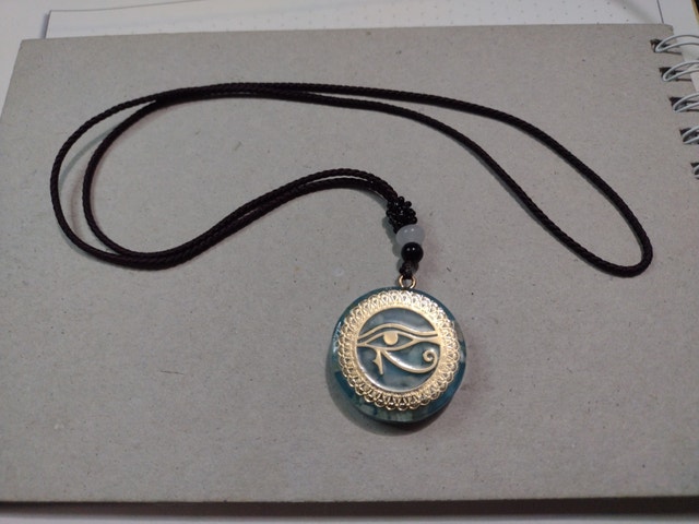 Eye of horus pendant necklace, gold on aquamarine - photo 2
