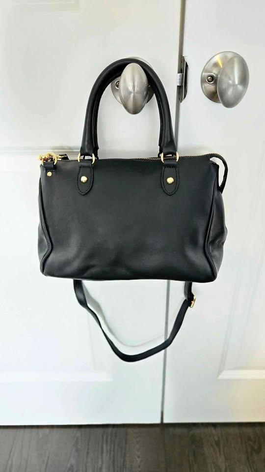 Roots leather handbag