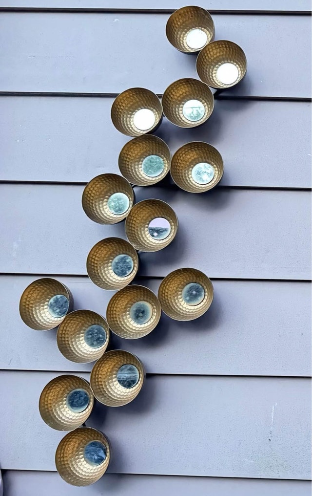 Gold Metal Wall Decor with Mirror Accents
