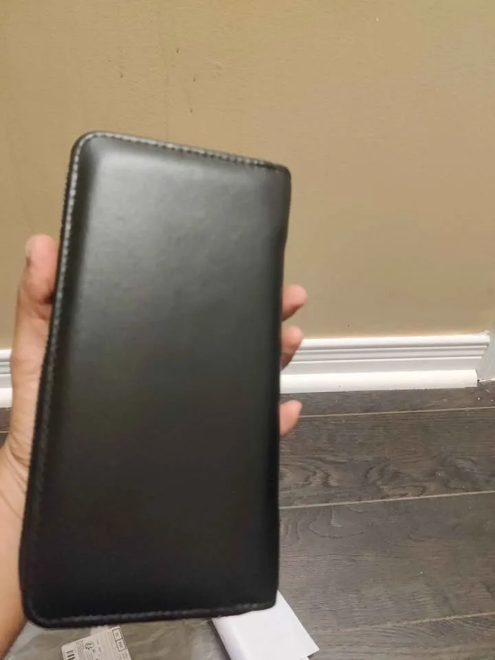 Brand new black color elegant faux leather phone. Wallet image indicator(3)