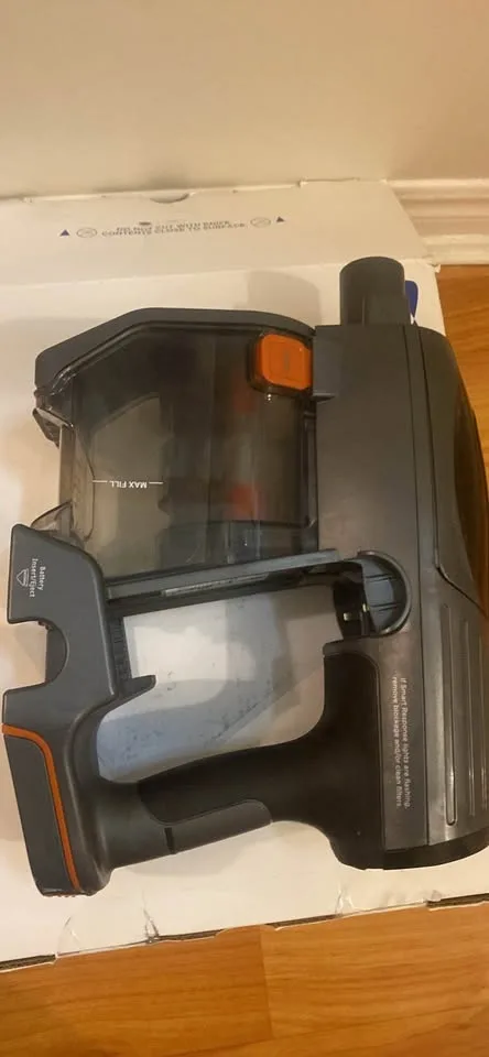 Shark Handheld Vacuum Unit: The motor, dust cup, and handle image indicator(4)