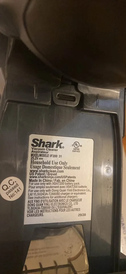 Shark Handheld Vacuum Unit: The motor, dust cup, and handle image indicator(5)