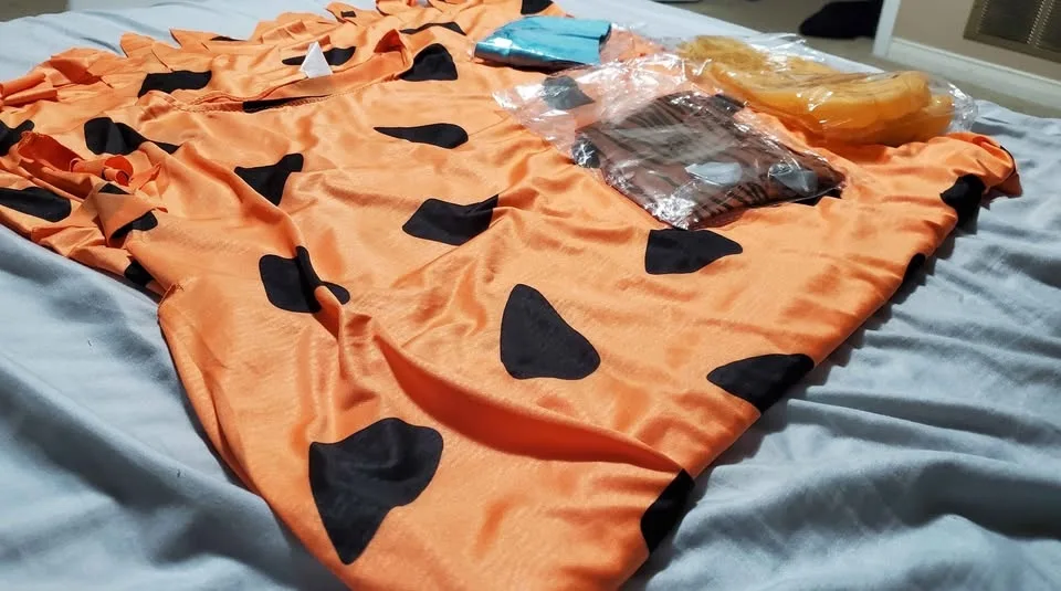 Fred Flintstone-style adult caveman costume set. image indicator(5)
