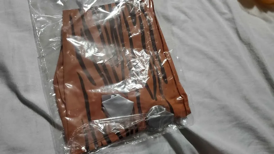 Fred Flintstone-style adult caveman costume set. image indicator(6)