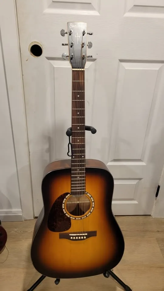 $500 Simon and Patrick Lefty Acoustic Guitar image indicator(2)