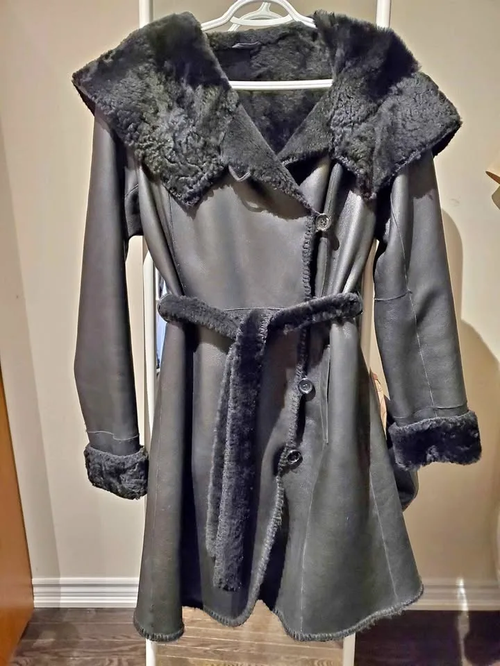 shearling coat by Danier good condition size-2XS