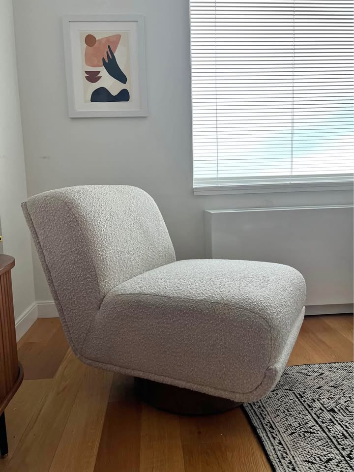 boucle swivel accent chair.