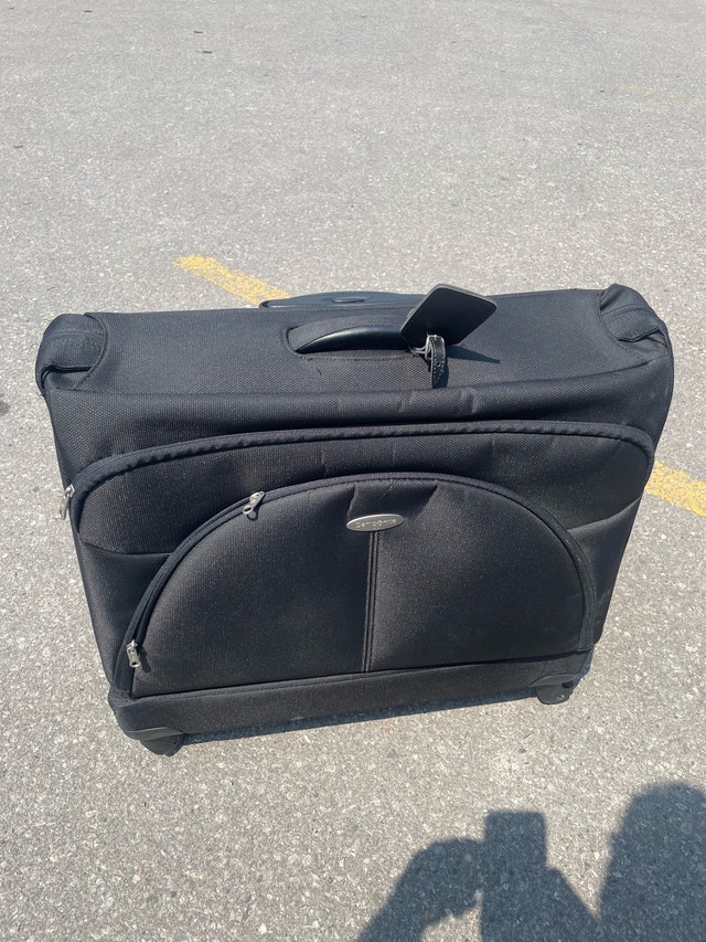 Samsonite Suit Carrier garment bag - four swivel spinner wheel