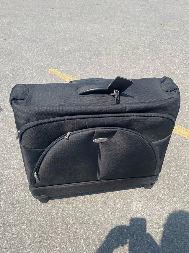 Samsonite Suit Carrier garment bag - four swivel spinner wheel