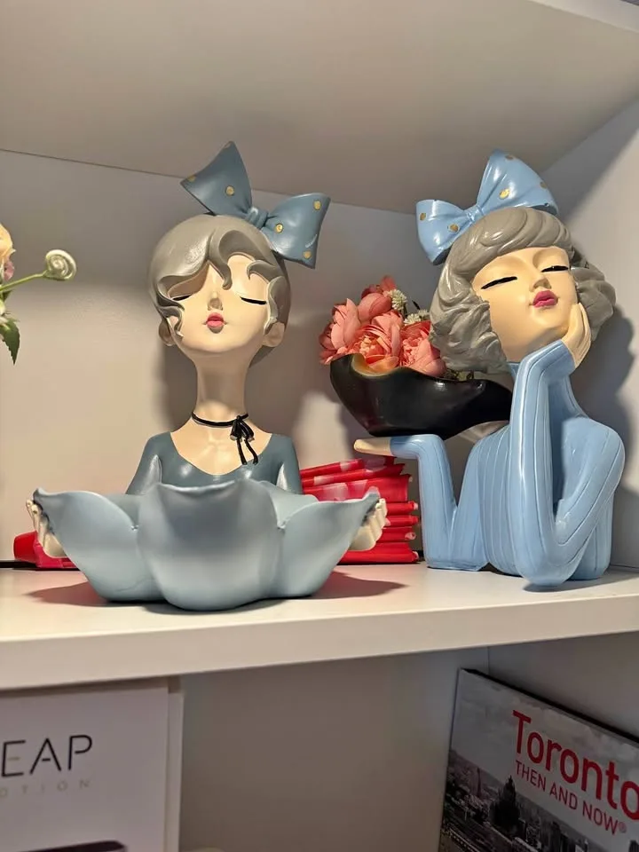 Pair of lady figurines