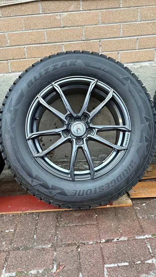 265/60 R 18 Acura rims and Bridgestone BLIZZAK winter tires