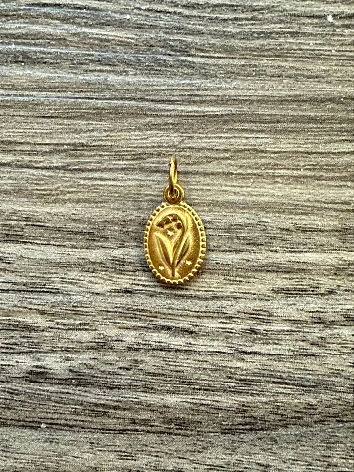 Gold pendant (Lily of the Valley, May)