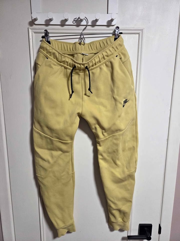 Nike tech pants