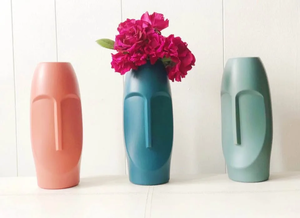 *NEW* PLASTIC face vase, dark blue SOLD image indicator(2)