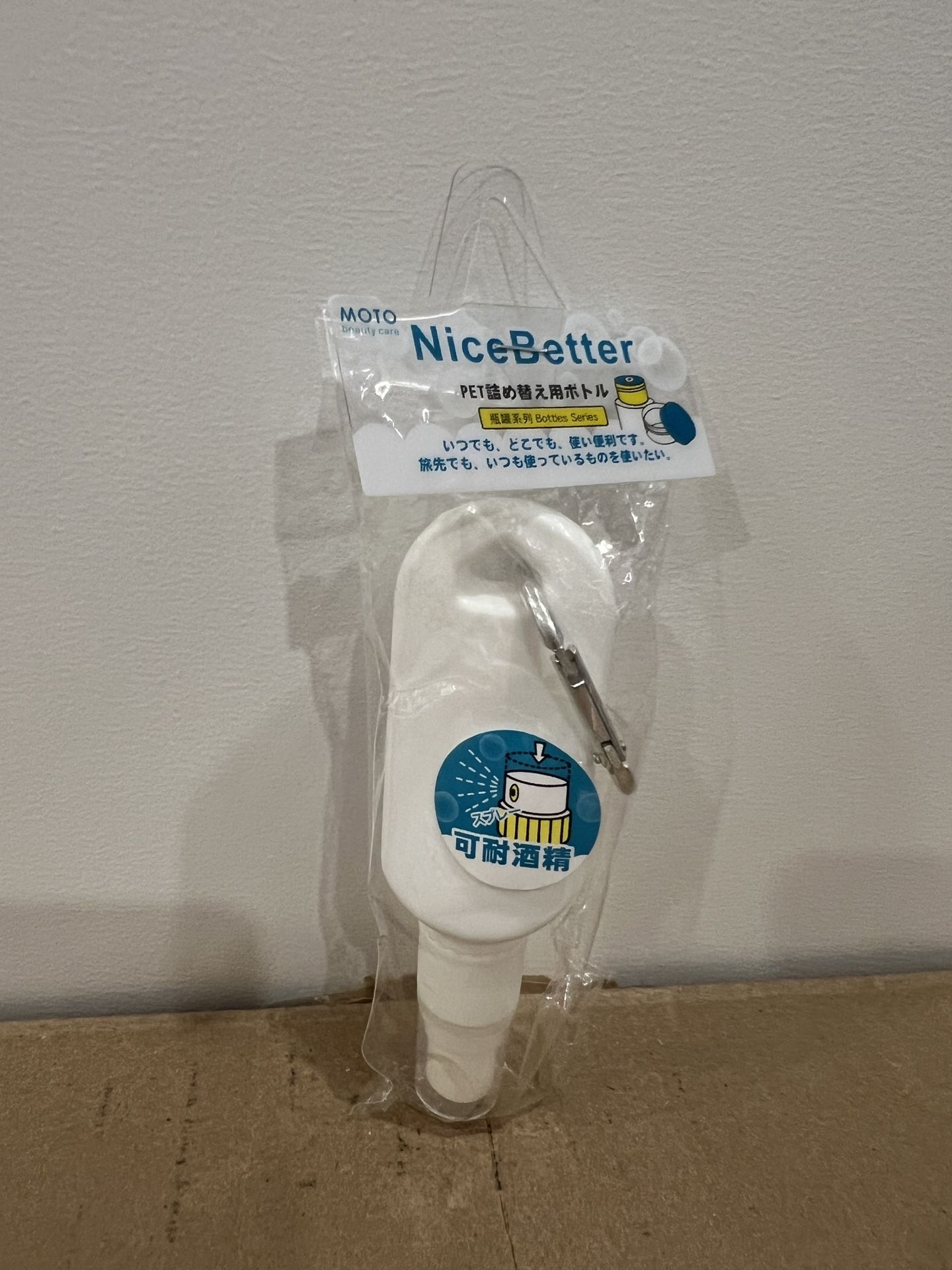Refillable hand sanitizer bottle