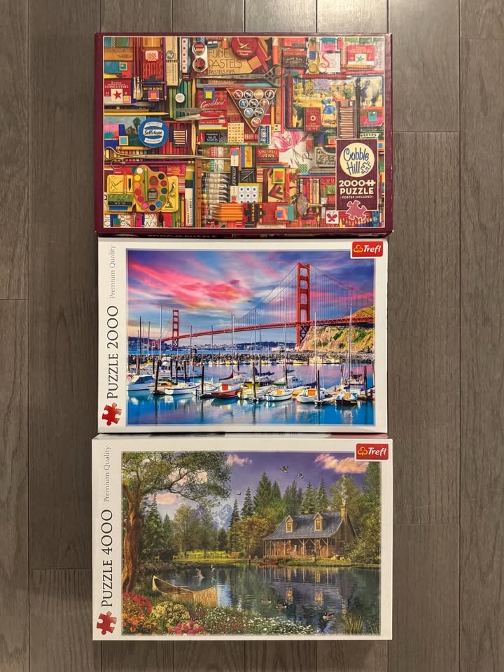 Puzzles Unopened and Once Completed - photo 2