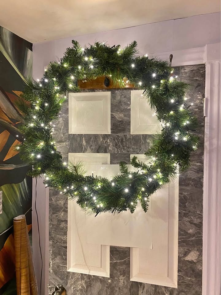 30” pre-lit artificial Christmas wreath with LED lights.