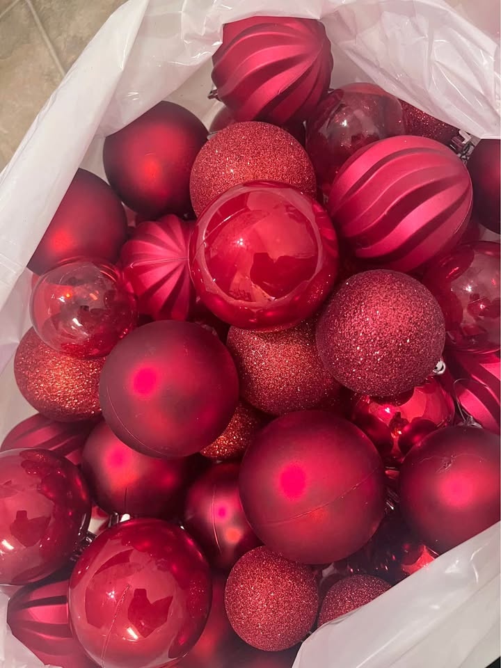 Beautiful red Christmas ornaments and red garland